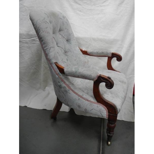 262 - A Victorian mahogany arm chair, upholstery in good condition for age.