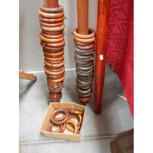 273 - 3 Victorian wooden curtain poles complete with rings.