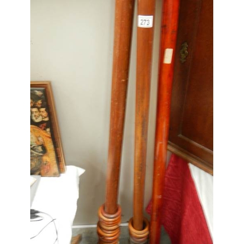 273 - 3 Victorian wooden curtain poles complete with rings.