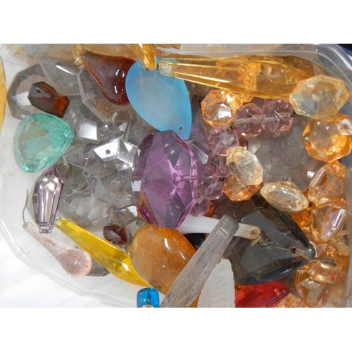 277 - In excess of 200 glass chandelier droppers in various shapes and colours.