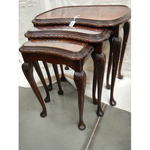 284 - A nest of 3 mahogany tables on cabriole legs.