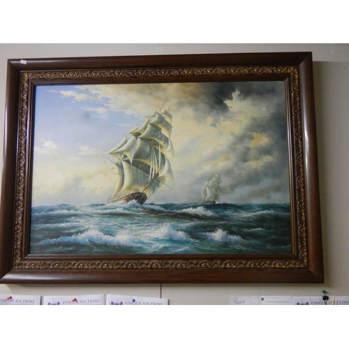 295 - A large oil painting of sailing ships on canvas, 31'' x 43''