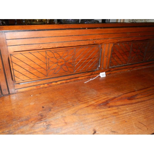 300 - An arts and craft sideboard in good clean condition for age.