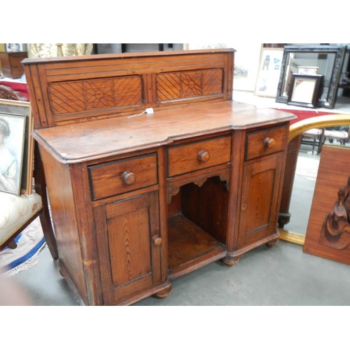 300 - An arts and craft sideboard in good clean condition for age.