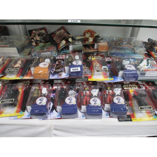 668 - A quantity of sealed Star Wars 'Attack of the Clones' Rogue 1 figures etc