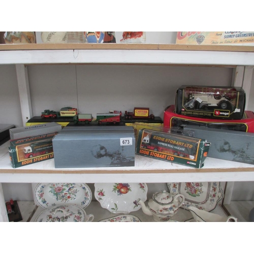 673 - A quantity of boxed Die cast including Corgi and Atlas Stobart lorries, Burago etc.