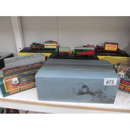 673 - A quantity of boxed Die cast including Corgi and Atlas Stobart lorries, Burago etc.