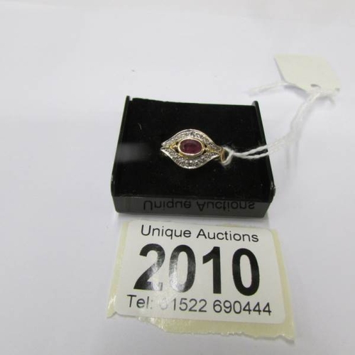 2010 - An 18ct gold ruby and diamond ring, size I half.