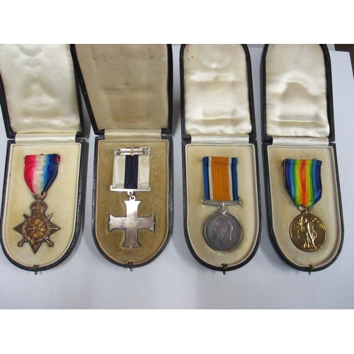 2061 - A Military Cross belonging to Captain H. R. Yorke, November 1917 and 3 First World War medals consis... 