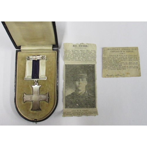 2061 - A Military Cross belonging to Captain H. R. Yorke, November 1917 and 3 First World War medals consis... 