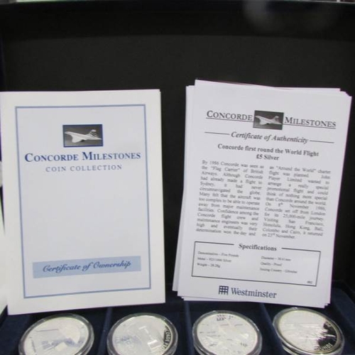 2065 - A cased 'Concorde Milestones' mint set coin collection of 12 silver £5 coins