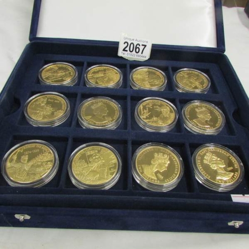 2067 - 18 cased mint East Caribbean $2 coins.