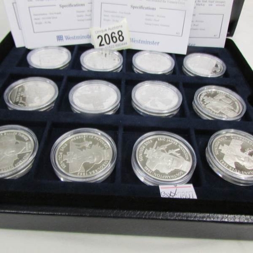 2068 - 18 cased mint silver £5 coins 'Victoria Cross Winners'.