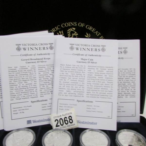 2068 - 18 cased mint silver £5 coins 'Victoria Cross Winners'.