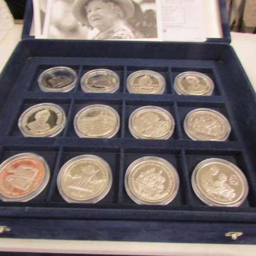 2069 - 2 cases containing 44 mint silver coins 'Her Majesty Queen Elizabeth The Queen Mother 1900 - 2002'