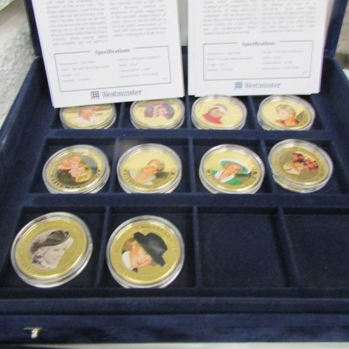 2070 - 2 cases containing 46 mint gold plated coins 'Diana, Princess of Wales' photographic portrait collec... 