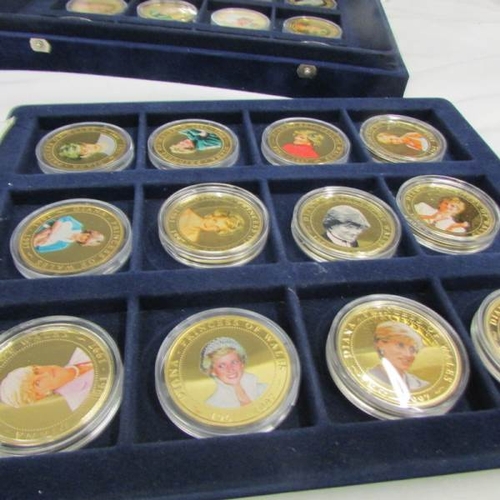 2070 - 2 cases containing 46 mint gold plated coins 'Diana, Princess of Wales' photographic portrait collec... 