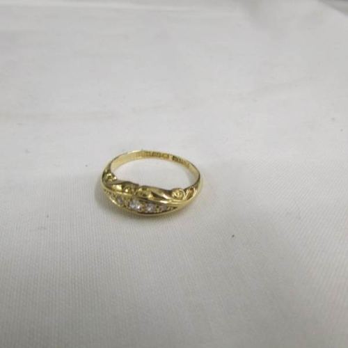 2097 - A finely worked gold five stone old cut diamond ring dated Birmingham 1908 in 18ct gold, size I half... 