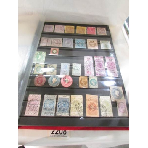 2208 - An album of approximately 750 Victorian UK and commonwealth stamps including 6 x 2d blues, 100 x pen... 