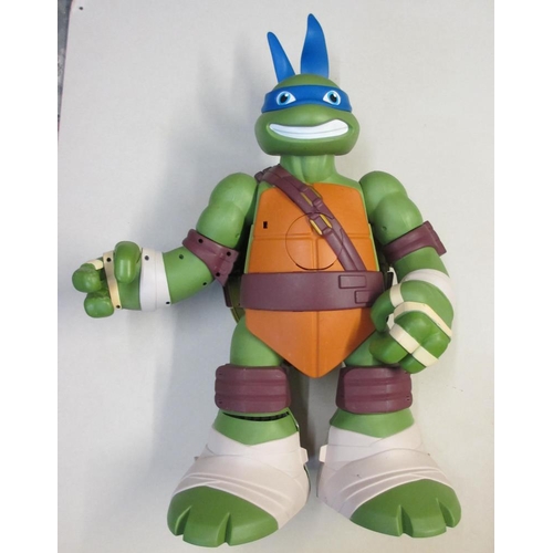 740 - A large Teenage Ninja Turtle figure that opens up into a Ninja facility  24 inches high (62cm)