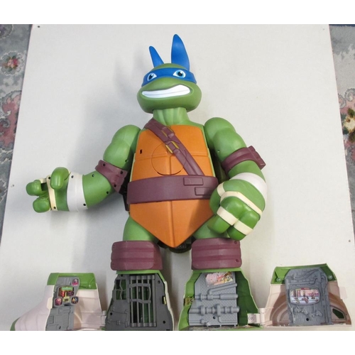 740 - A large Teenage Ninja Turtle figure that opens up into a Ninja facility  24 inches high (62cm)