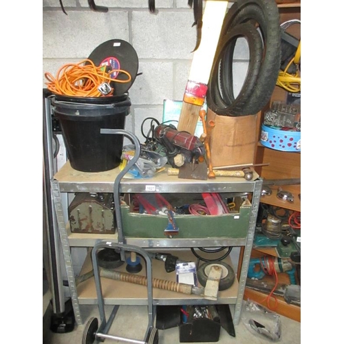 1027 - Four shelves of car bike and trailer spares with tools, boxes, roof rack etc