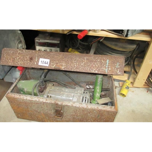 1044 - A 110V Kango Breaker with bits, a Thurlby Pl154 15v/4A power supply and 2 110V ext cables