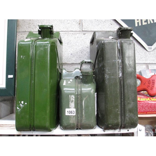 1063 - 2 large 20 litre jerry cans and a half size 10 litre can