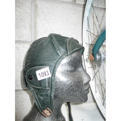 1093 - A vintage green leather motorcycle helmet size 60