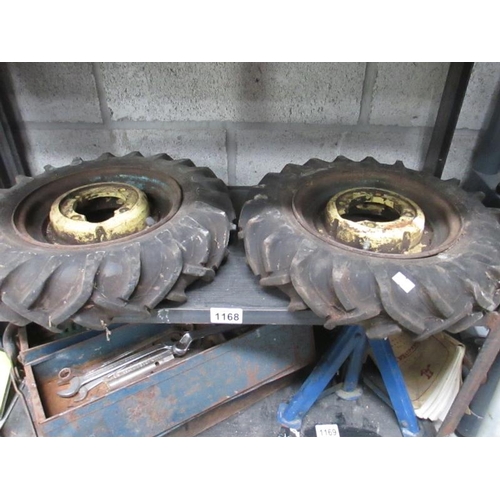 1168 - A pair of heavy duty barrow wheels and tyres