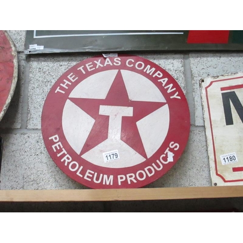 1179 - A round  The Texas Company Petroleum Products painted metal sign