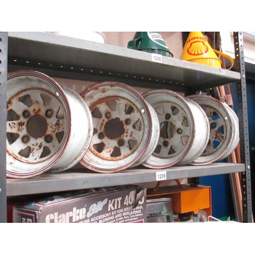 1209 - A set of 4 Mini type pressed steel wide wheels