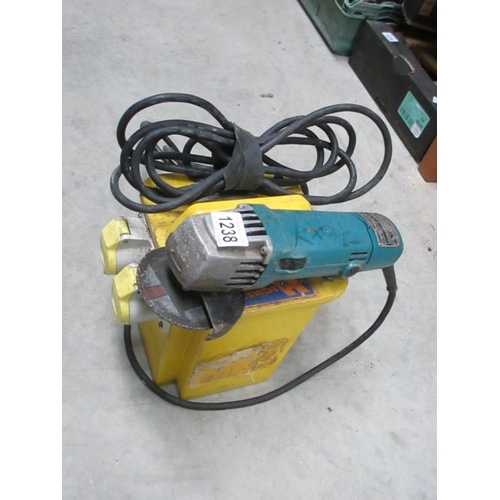 1238 - A 100 volt transformer and a 110 volt Makita angle grinder