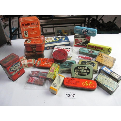 1307 - A quantity of vintage boxed car light bulbs, John Bull tyre repair kit tins etc