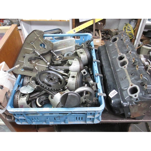 1308 - A Chevrolet 350 cylinder head, con rods, pistons, bolts etc