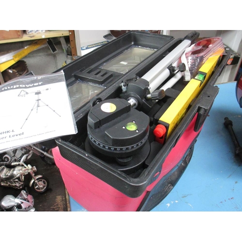 1310 - A Powerfix fan heater, a rockbox tool box, radio and a laser level