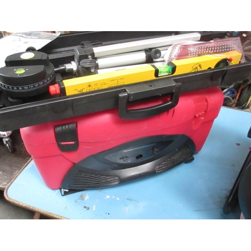 1310 - A Powerfix fan heater, a rockbox tool box, radio and a laser level