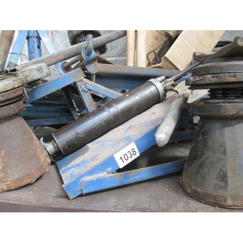 1038 - 2 quality jacking car ramps, axle stands and four jacks and a selection of grease guns