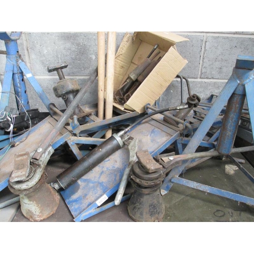 1038 - 2 quality jacking car ramps, axle stands and four jacks and a selection of grease guns