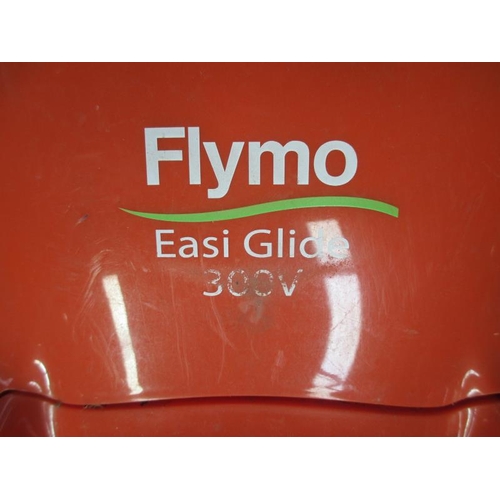 1445 - A Flymo easi glide 300v lawn mower.