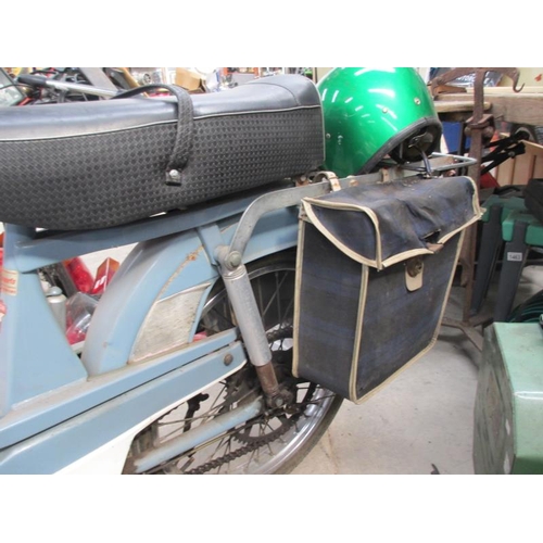 1454 - A 1970-71 Mobilette Motobecane 50cc moped with panniers and luggage rack.  Last used in 1980 with 96... 