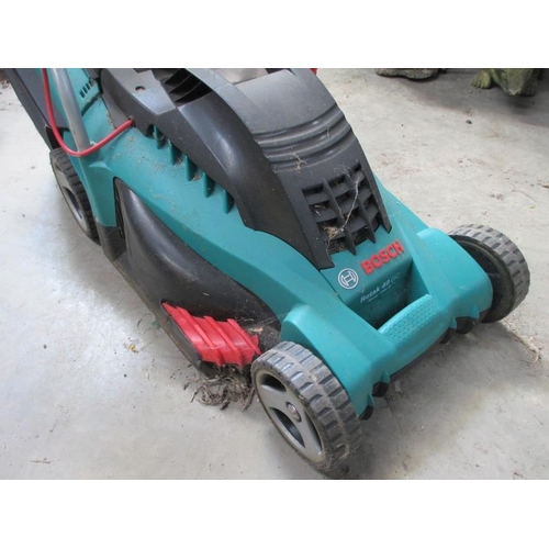 1456 - A Bosch electric lawn mower with grass box.