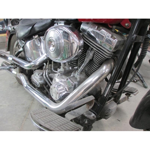 1484 - A 2004 red Harley Davidson V twin with security alarm, 1450cc, first registered May 2004., straight ... 