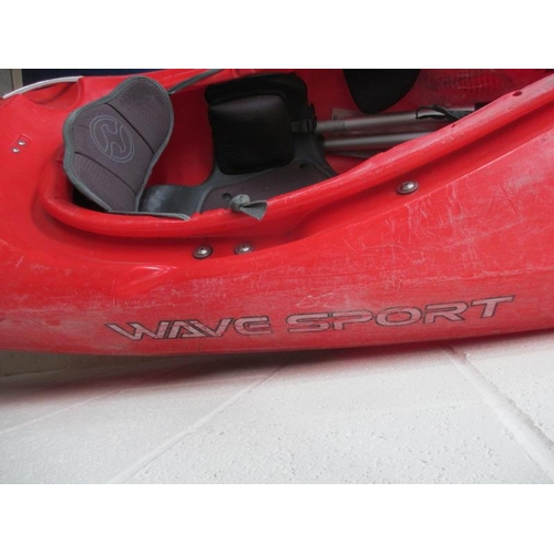 1495 - A good quality fibre glass canoe made by Diesel 75 Wavesport with alloy oars.