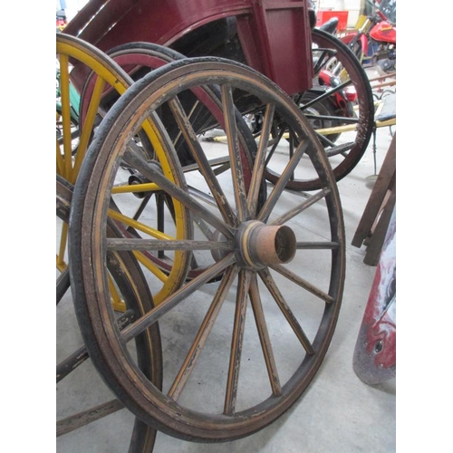 1502 - A large decorative wagon wheel, approximately 4ft diameter.