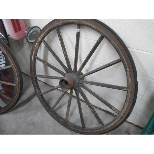 1502 - A large decorative wagon wheel, approximately 4ft diameter.