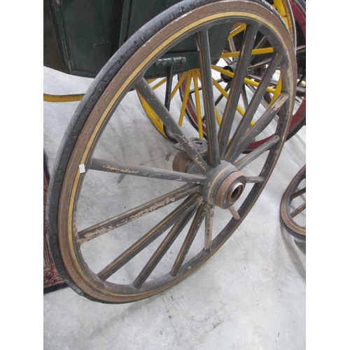 1503 - A large decorative wagon wheel, approximately 4ft diameter, with 11'' hub..