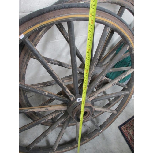 1503 - A large decorative wagon wheel, approximately 4ft diameter, with 11'' hub..