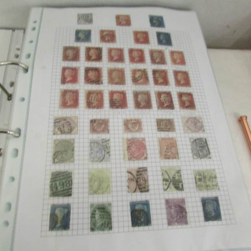 2352 - A folder of UK stamps including a penny black, 21 penny reds, 13 twopenny blues and other stamps fro... 