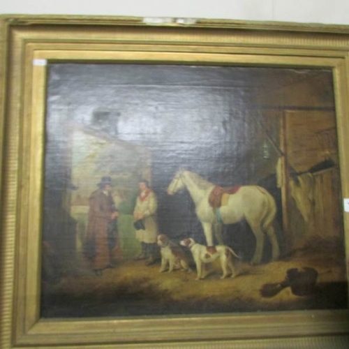 2366 - A gilt framed oil on canvas stable scene.